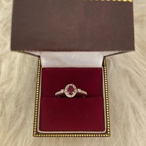 18k white gold ruby and diamond solitaire ring